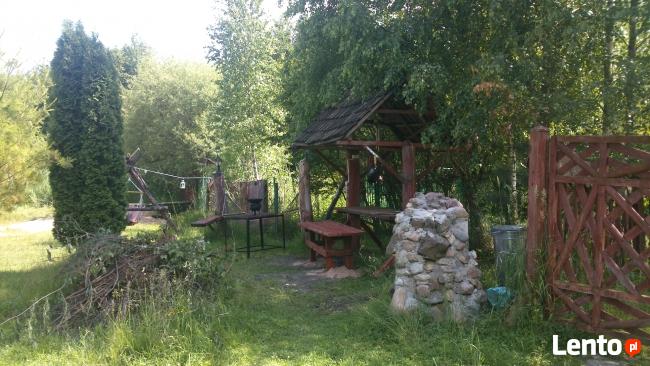 domek drewniany nad jeziorem Mazury