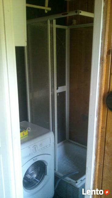 domek drewniany nad jeziorem Mazury