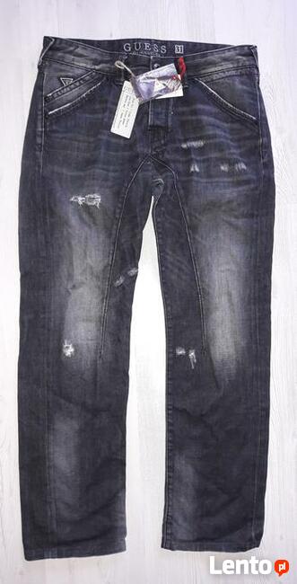 Spodnie Jeans damskie przetarcia Guess - oryginalne