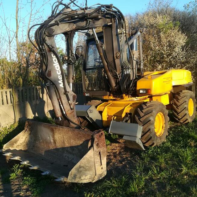 Usługi koparką, Koparkoładowarką Mecalac12 Advert M.B