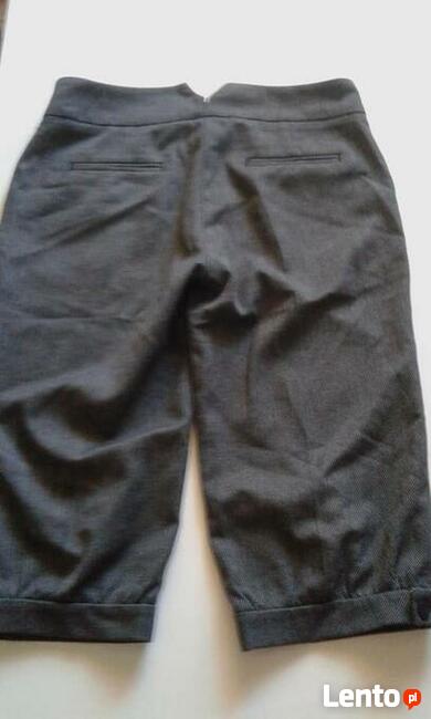 odsprzedam sweterek H&M eleganckie rybaczki w delikatna krat