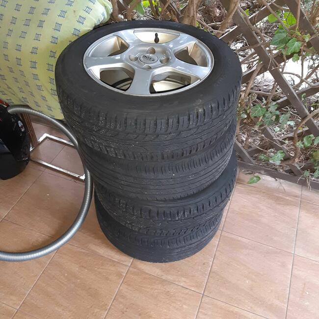 koła aluminiowe z oponami jeden sezon 4 sztuki.