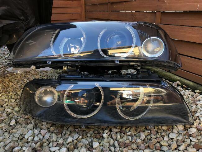 Reflektory E39 FL lift XENON HELLA BLACK lewy + prawy *NOWE*