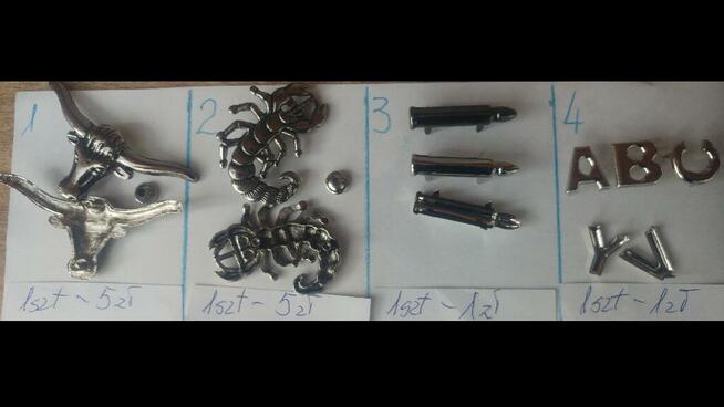 Różne nity i ćwieki ozdobne.