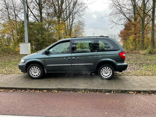 Voyager przystosowany dla inwalidy na wózku