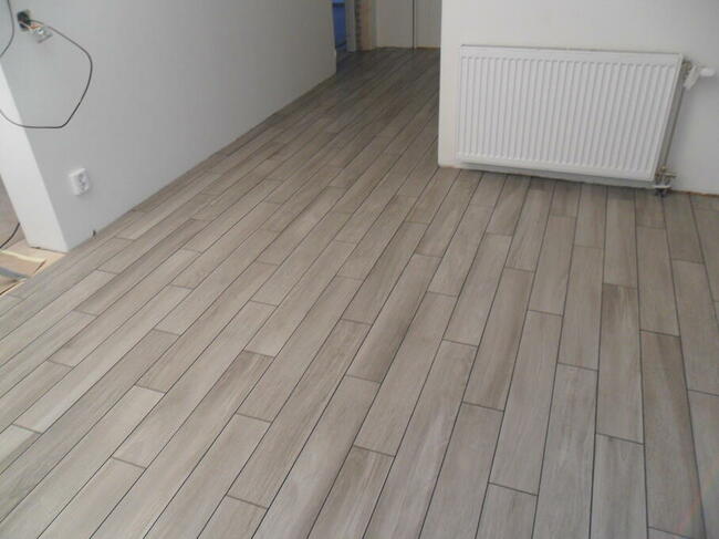 USŁUGI REMONTOWE: Układanie płytek, Zabudowy gipsowo-kartono