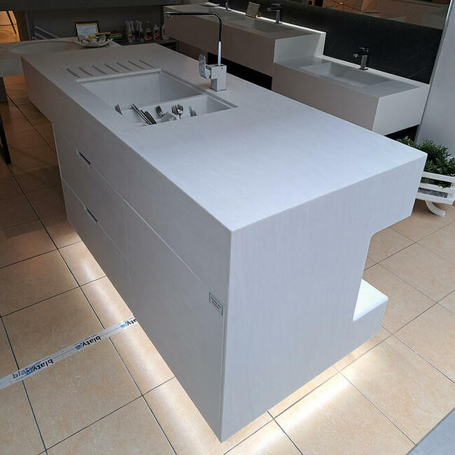 Wyspa kuchenna wykonana z kompozytu ze zintegrowanym zlewem