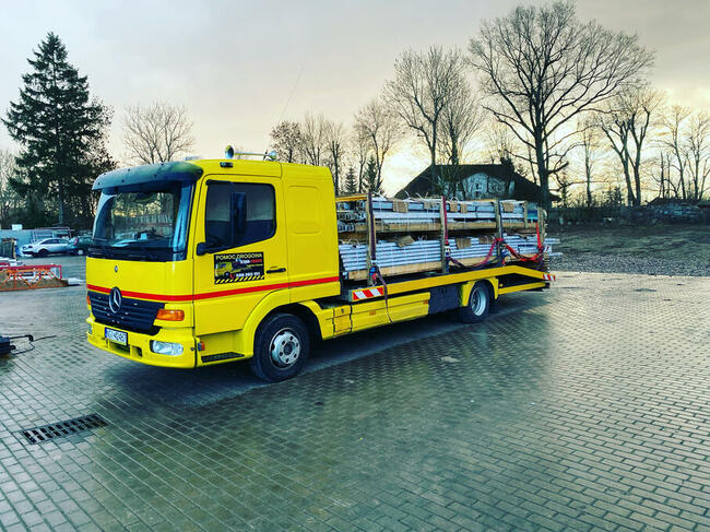 Pomoc drogowa autolaweta laweta usługi transportowe mrągowo