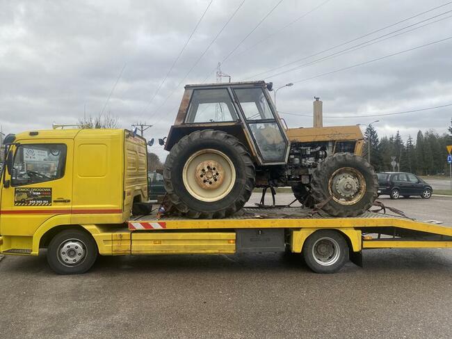 Pomoc drogowa autolaweta laweta usługi transportowe mrągowo