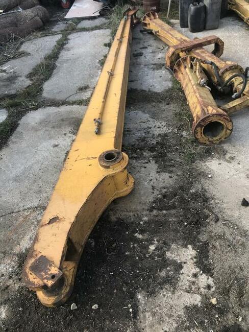 Chwytak do kopania studni i fundamentów z ramionami