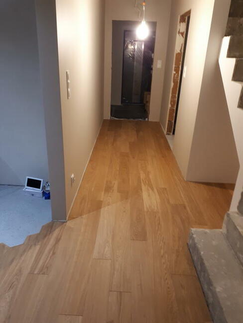 Układanie montaż Paneli podłogowych i Deski warstowej