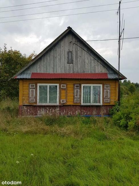 Dom drewniany na wsi KJB