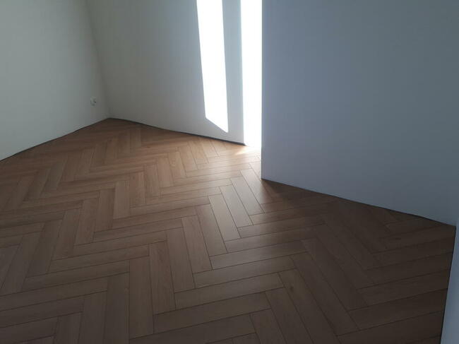 Układanie montaż Paneli podłogowych i Deski warstowej