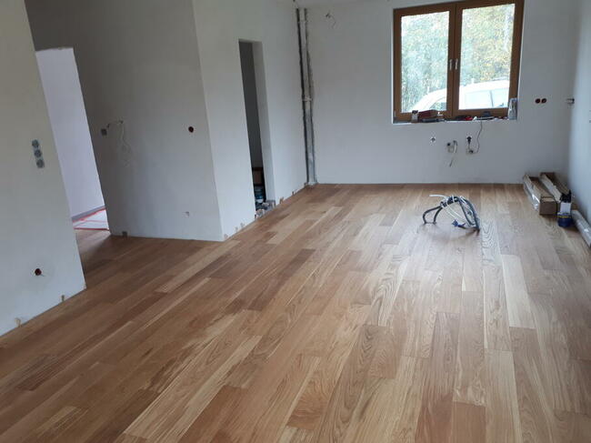 Układanie montaż Paneli podłogowych i Deski warstowej