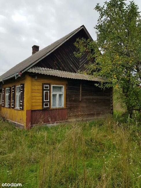Dom drewniany na wsi KJB