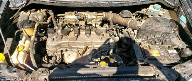 Nissan Almera Tino 1.8b klimatyzacja