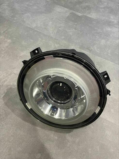 Reflektory Lampy Koplet Prawa Lewa Mercedes W463 Hella