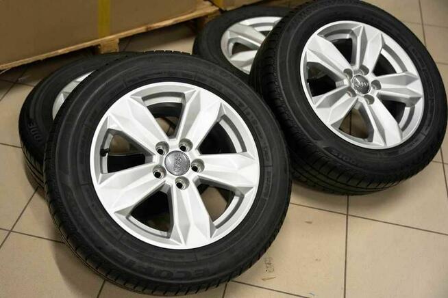 Felgi Audi A1 R15 Et37 6j + Opony Zimowe Bridgestone 185/65