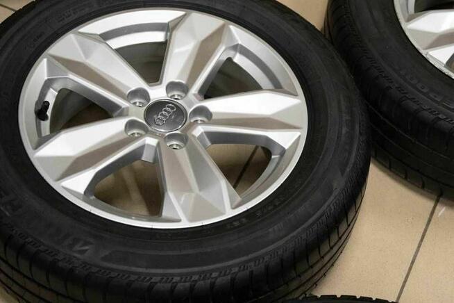 Felgi Audi A1 R15 Et37 6j + Opony Zimowe Bridgestone 185/65