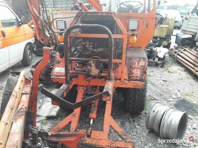 Koparka kołowa z łyżką i chwytakiem Hansa mercede