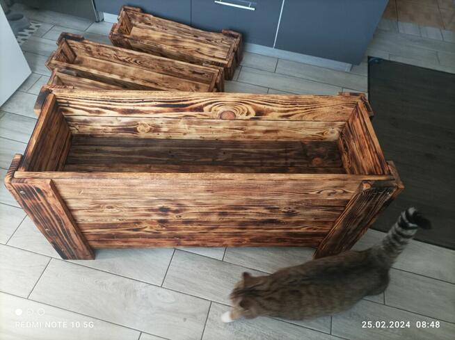 Drewniana donica 67x17x14-opalane impregnowane.