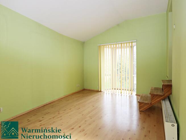 Dom z lokalem usługowym i dwoma garażami