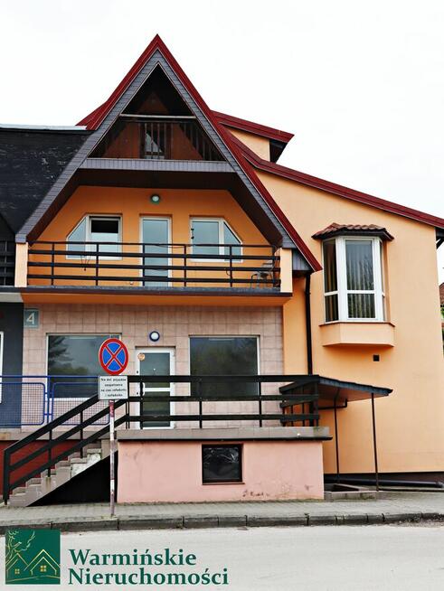 Dom z lokalem usługowym i dwoma garażami