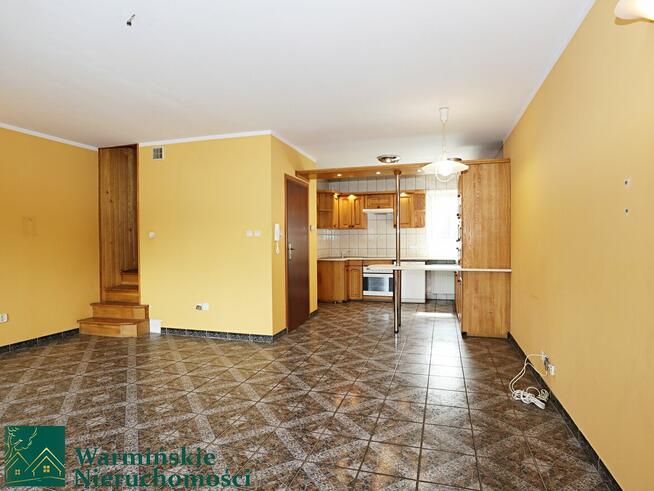 Dom z lokalem usługowym i dwoma garażami