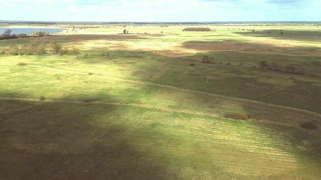 Działka rolna niezabudowana Komarowo nad jeziorem