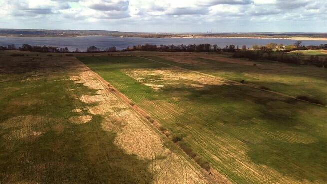 Działka rolna niezabudowana Komarowo nad jeziorem