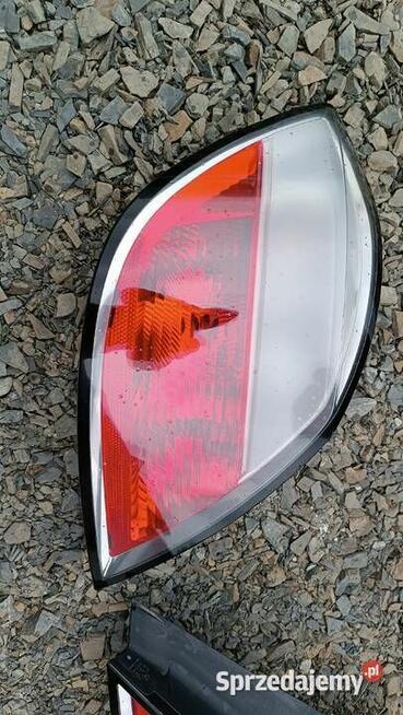 Lampa tył tylna prawa lewa Opel Astra H III Europa 5D