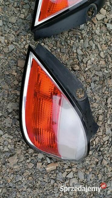 Lampa tył tylna prawa lewa Opel Astra H III Europa 5D