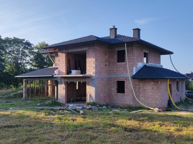 Dachy, domy szkieletowe, tarasy, altany, pergole, sauny