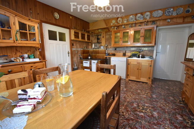 2 domy, 7 pokoi + 160 m2 b.gospodarcze, staw i las