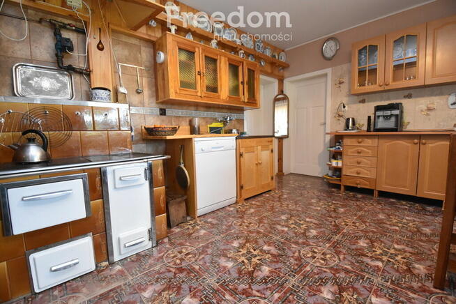 2 domy, 7 pokoi + 160 m2 b.gospodarcze, staw i las