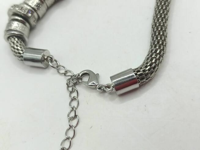 Biżuteria bransoletka łańcuch z elementami kolor srebrny