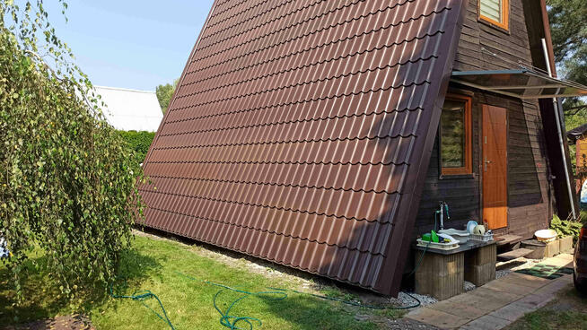 Działka z domem przy jeziorze Piaseczno