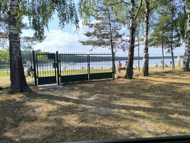 Działka z domem przy jeziorze Piaseczno