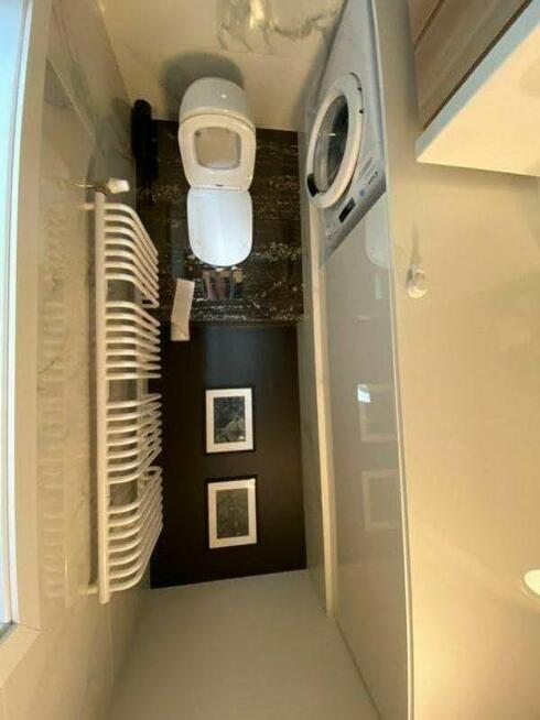 Wynajmę piękną, duża kawalerkę w nowym apartamentowcu.