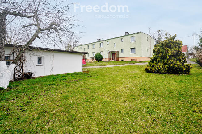 Mieszkanie z garażem i działką