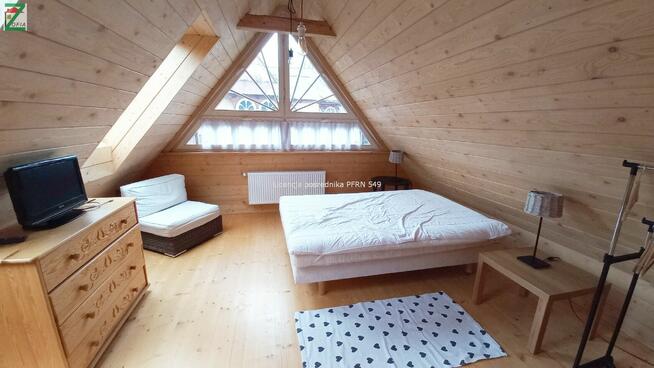 Drewniany dom wolnostojący