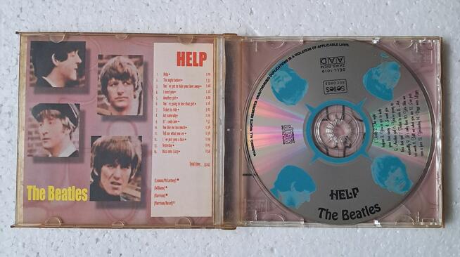 The Beatles . Help .