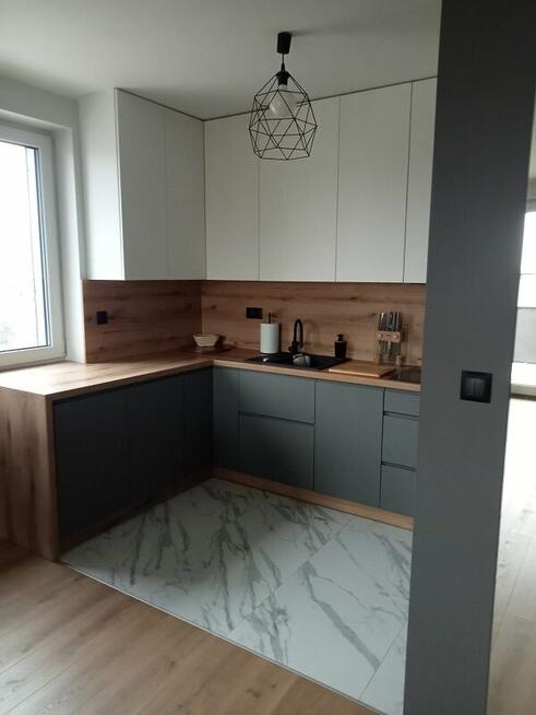 2 pokoje, 51.85m2, duży balkon, umeblowane, ul. Poznańska 30