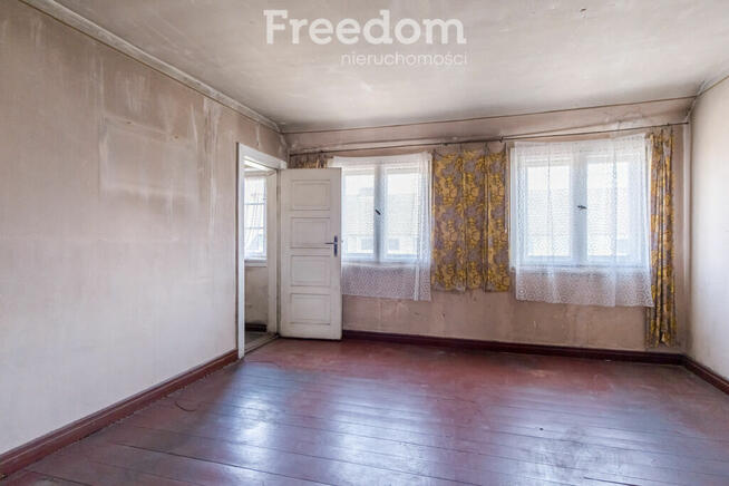 Dom ciekawej w zabudowie szeregowej z ogródkiem