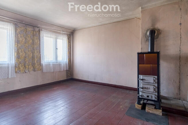 Dom ciekawej w zabudowie szeregowej z ogródkiem