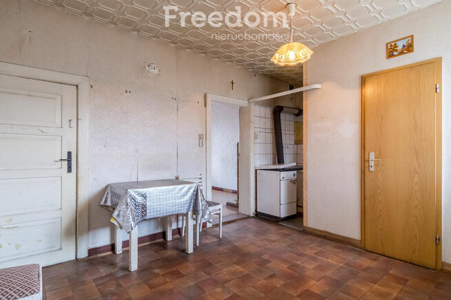 Dom ciekawej w zabudowie szeregowej z ogródkiem