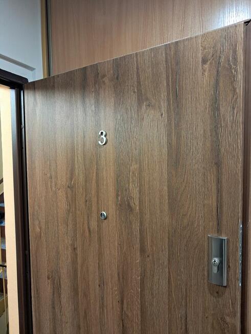 Drzwi drewniane metalowe do bloku z montażem Poznań OD RĘKI