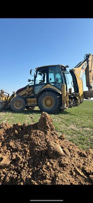 Usługi koparko ładowarka Cat buk /pniewy/szamotuly