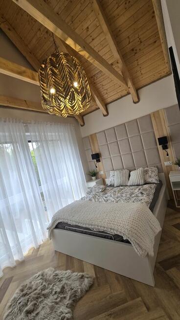 Dom 2-poziomowy nad jeziorem