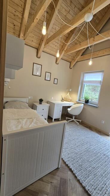 Dom 2-poziomowy nad jeziorem